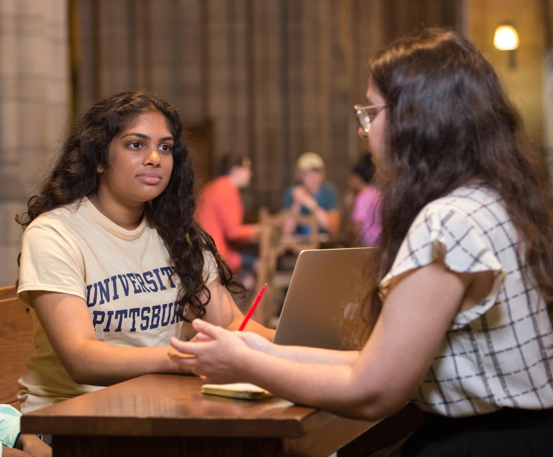 Student meet in the cathedral of learning